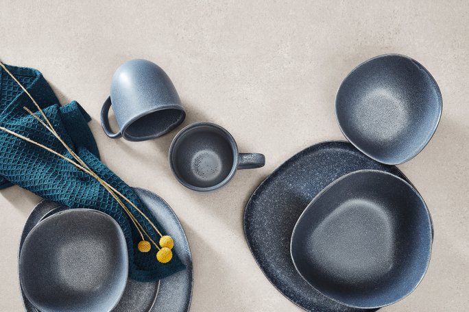 Bordplade i lys sten struktur